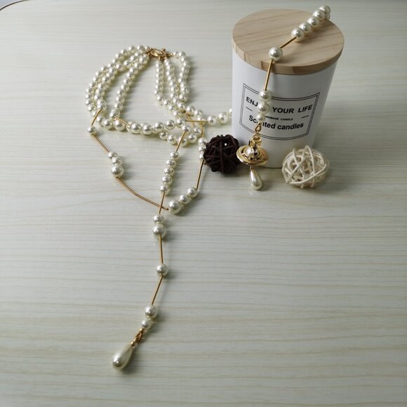 Vivienne Westwood Irregular Three Row Pearl Bas Relief Choker in gold - Picture 9 of 9